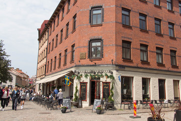 Fototapeta na wymiar Gothenburg, Sweden - June 18 2019: the view of Haga district typical street on June 18 2019 in Gothenburg, Sweden.