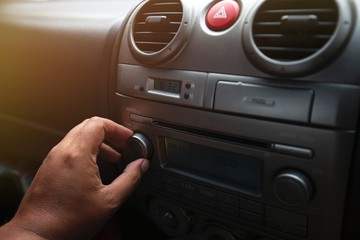 hand holding a car audio