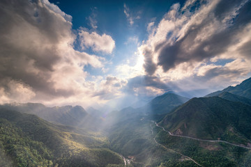 The magical sunset on O Quy Ho mountain pass before sunset. O Quy Ho Mountain Pass (Sapa, Vietnam) is Vietnam's longest mountain pass.