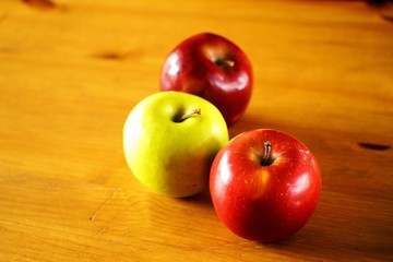 apples on wooden table