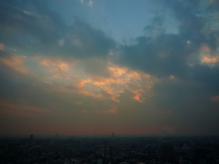The dim red sun which glares down in the sky