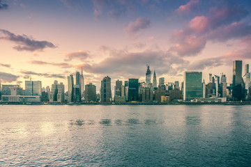 Fototapeta premium An aerial view of NYC skyline. Skyscrapers of midtown in Manhattan along East river