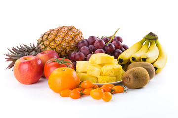 Close-up variety of fresh fruits on the bright table