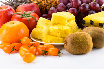 Close-up variety of fresh fruits on the bright table