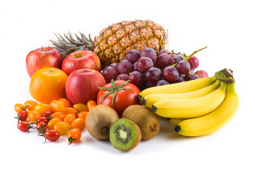 Fototapeta na wymiar Close-up variety of fresh fruits on the bright table