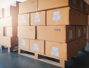 Carton boxes, Shipment, Manufacturing warehouse. Stack of cardboard boxes or packages goods for delivering to a customer.