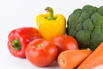 Variety of fresh vegetables on white background