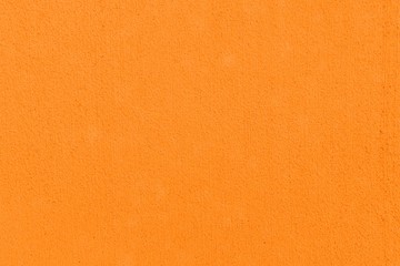 Patterned cement wall Vintage yellow painted texture and background