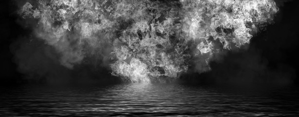 Panoramic view black and white fire. Perfect explosion effect for decoration and covering on black background. Concept burn flame and light texture overlays. Reflection on water.