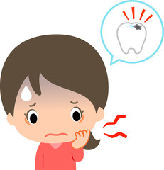 虫歯が痛くて頬を押さえる若い女性