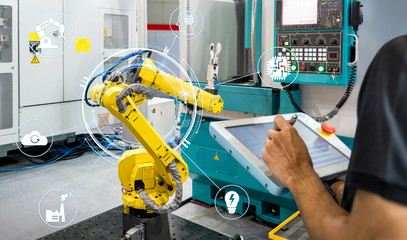heavy automation robot arm machine in smart factory industrial,Industry 4.0 concept image.

