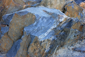 Close-up of granite rock. Natural stone wall background