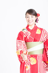 けん玉で遊ぶ女性