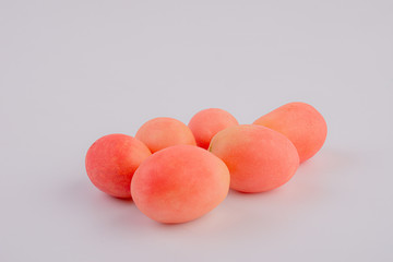Fresh red Seeda tomatoes on white background, Thai tomatoes