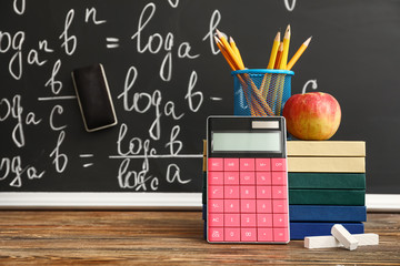 Stationery on desk in classroom
