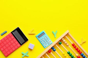 Composition with calculators on color background