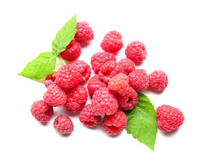 Tasty ripe raspberries on white background