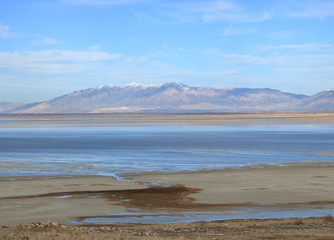 Wasatch Mountains beckon in the distance across the waters of the Great Salt Lake, Antelope Island, Utah
