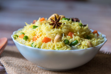 Star anise on flavoured rice with vegetable