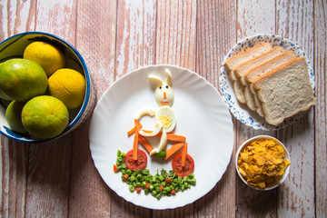 Top view of breakfast items arranged on a background