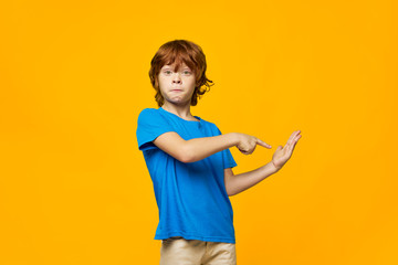 red-haired child freckles boy blue 