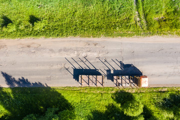 bad asphalt road with large holes top view, federal highway of the Vologda and Kostroma regions in...