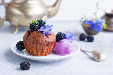 chocolate muffin with blackberry ice cream, lilac food, dessert