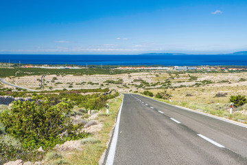 Scenic road beautiful island of Pag to town of Novalja in Croatia, Adriatic landscape