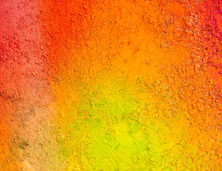 Beautiful bright colorful street art graffiti background. Abstract creative spray drawing fashion colors on the walls of the city. Urban Culture, ginger, red , orange , yellow, green, blue texture