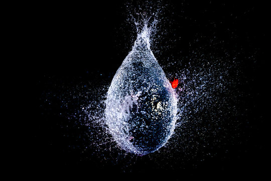 The moment of the water balloon explosion
