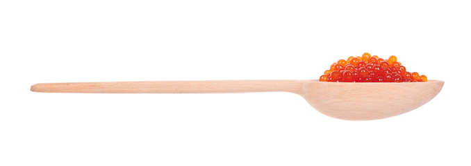 Luxury red caviar on wooden spoon, expensive healthy seafood, isolated on white background.