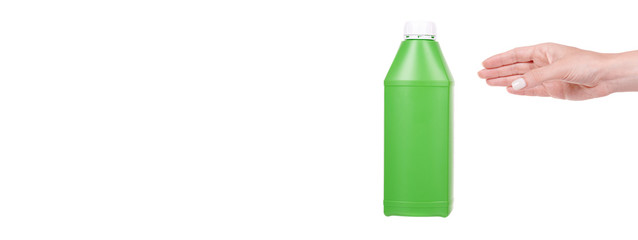 Obraz premium Hand with green plastic container with engine oil. Anti fungus detergent for bacthroom. Isolated on white background, copy space template, banner.