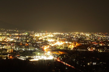 Aerial night panorama of the town called, SUWA in Nagano, Japan