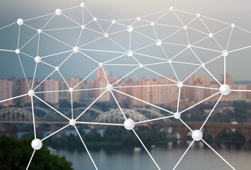 Machine learning concept. Digital web over blurred cityscape