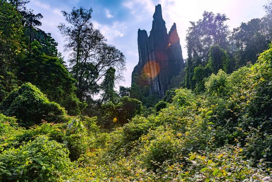 .The huge rock is composed of solid black, crystalline karst limestone in a tourist place Yana Rocks this is an old stone formation with caves inside. Karnataka. India. Indian tourism concept