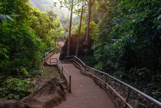 magical trails through a mountain forest in a tourist place Yana Rocks this is an old stone formation with caves inside. Karnataka. India. Indian tourism concept
