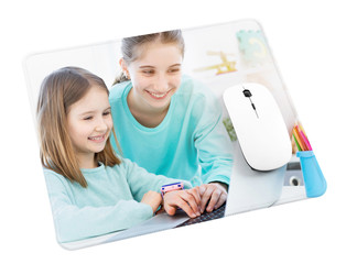 Computer mouse on pad with printed photo © Ievgen Skrypko
