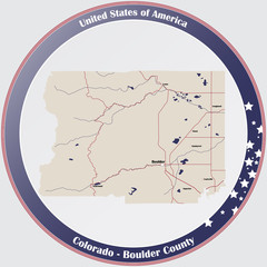 Round button with detailed map of Boulder County in Colorado, USA.