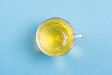 cup of tea on blue table Top view Flat lay Style life Beverages, lose weight concept