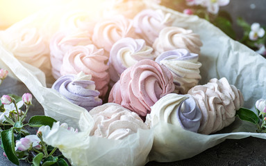 Assortment of homemade marshmallow in craft paper, close up view