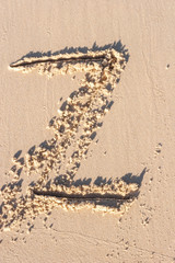 Z - Alphabet letter written on sand
