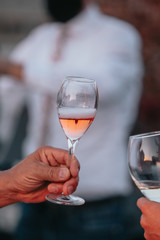 Glasses of white and pink sparkling wine on the table at the restaurant. Special wine tasting.