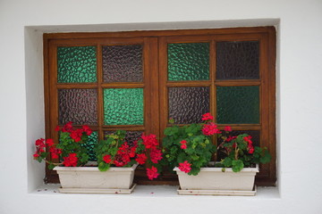 Fototapeta na wymiar stained glass wooden window with flowers