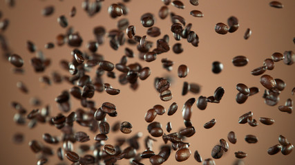 Coffee beans flying in the air in freeze motion