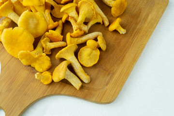 mushrooms on a wooden chopping board