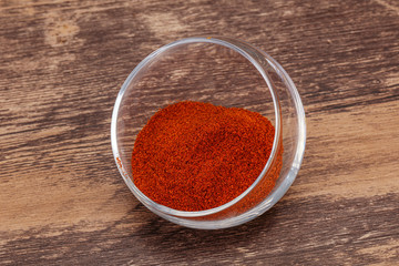 Dry paprika powder in the bowl