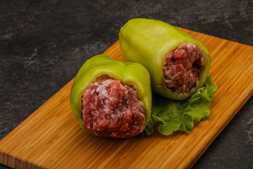Raw stuffed bell pepper with meat