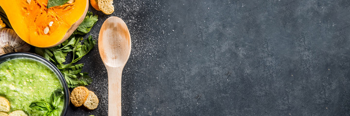 Different autumn soups set. Assortment vegetable soups in portion bowls - corn, potato, pumpkin, tomato, zucchini, broccoli cream soups. top view copy space