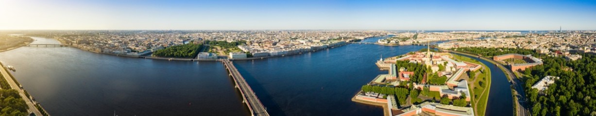 Fototapeta na wymiar Panorama of the central part of St. Petersburg Troitsky Bridge and Aerial view of Peter and Paul Fortress in Saint-Petersburg
