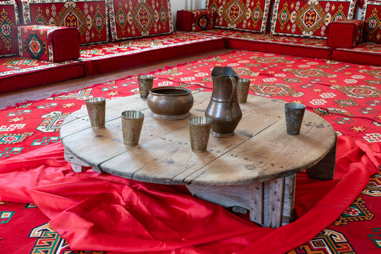 Old style table (sofra in Turkish) with oriental floor.